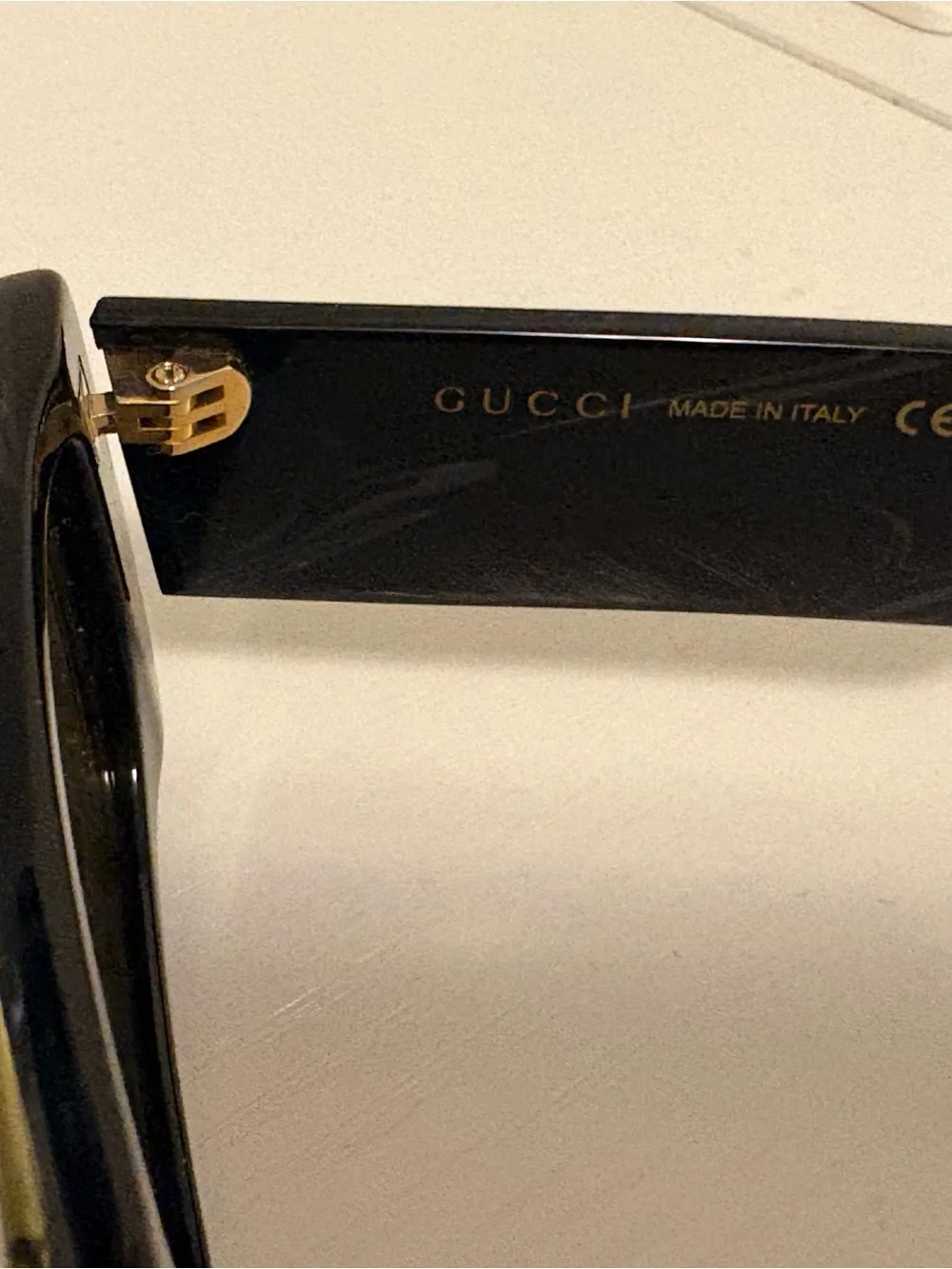Gucci Black Sunglasses with Gold Accent Logo